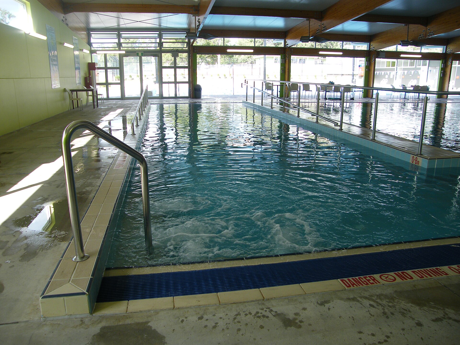 Indoor training pool with an accessible entry ramp